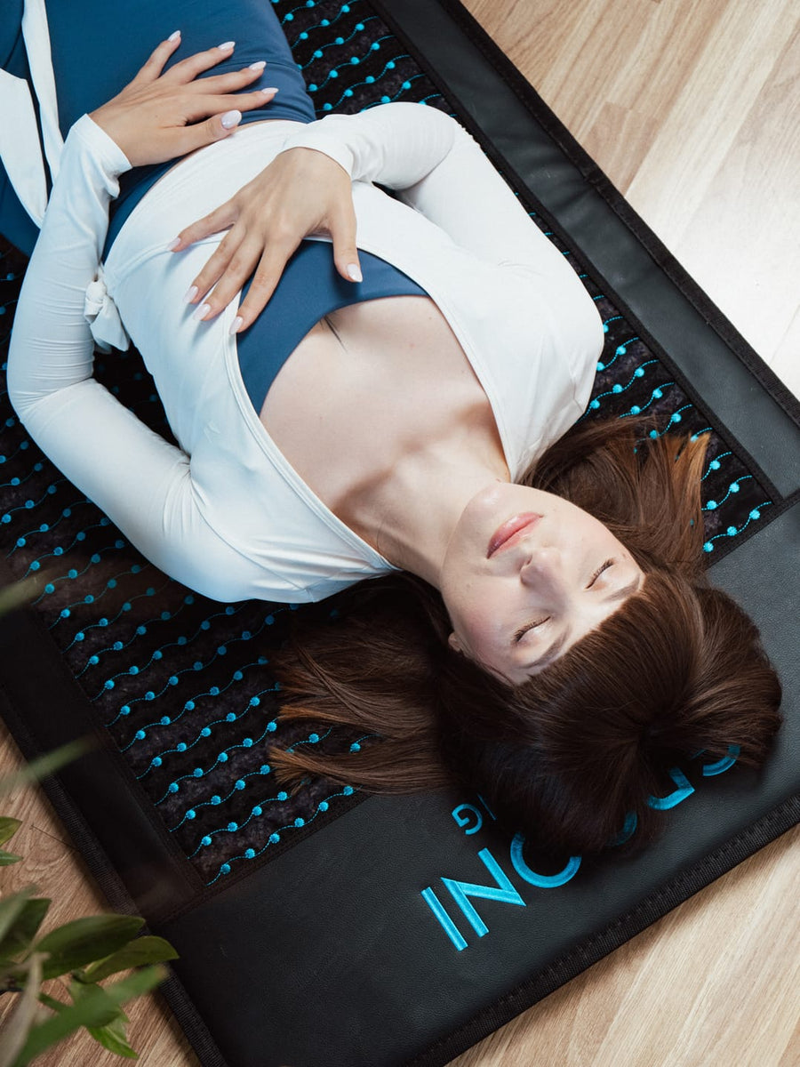 Close-up of person resting on Grooni mat