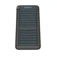 Black chair pemf mat with grid pattern and 'Grooni' branding on a white background