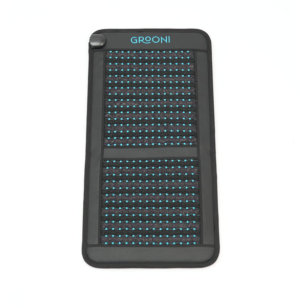 Black chair pemf mat with grid pattern and 'Grooni' branding on a white background