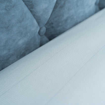 Detailed photo of a beige grounding sheet in a well done bed showcasing silver threads for conductivity
