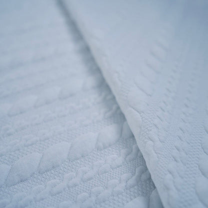 Close-up of textured light grounding blanket