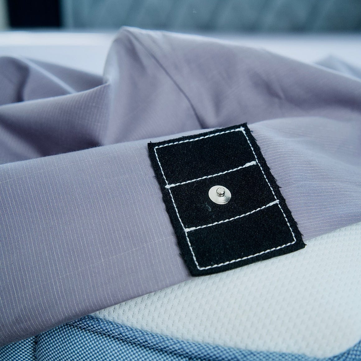 Close up of a grey grounding sheet plug in connection