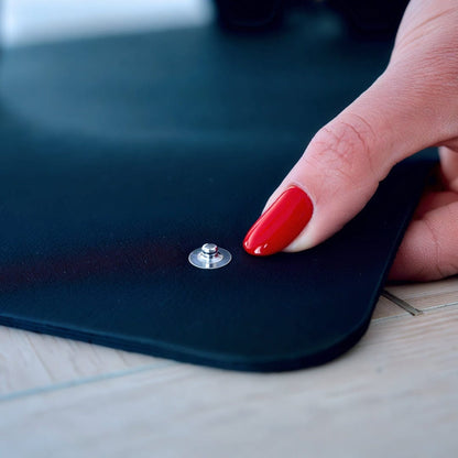 Closeup of a grounding yoga mat plug in
